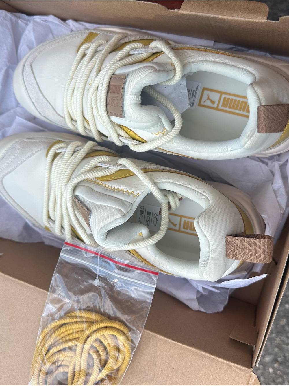 Puma Cream and Gold Low-Top Sneakers